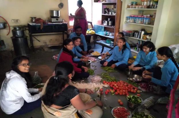Students serving meals at Warkamai Vruddhashram