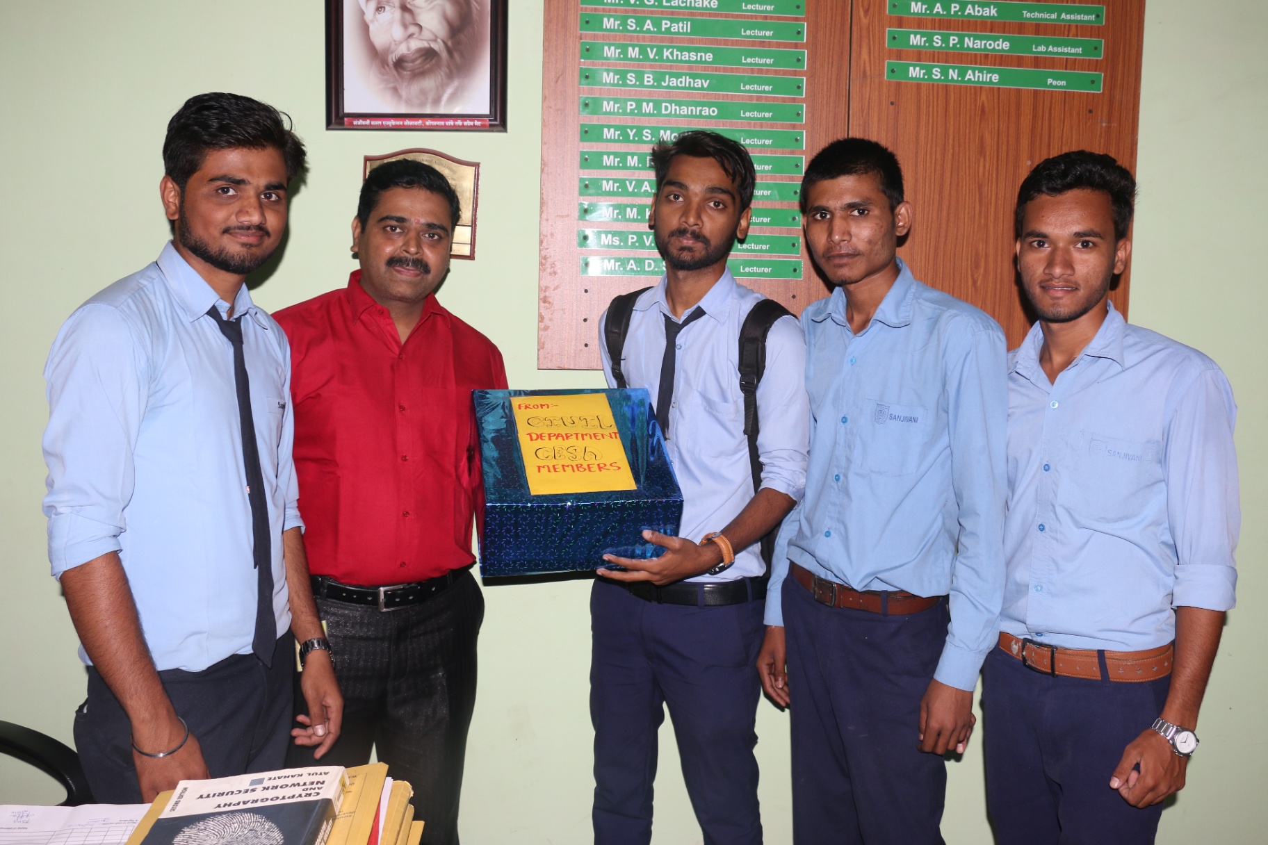 GDSA members present a gift to the HOD